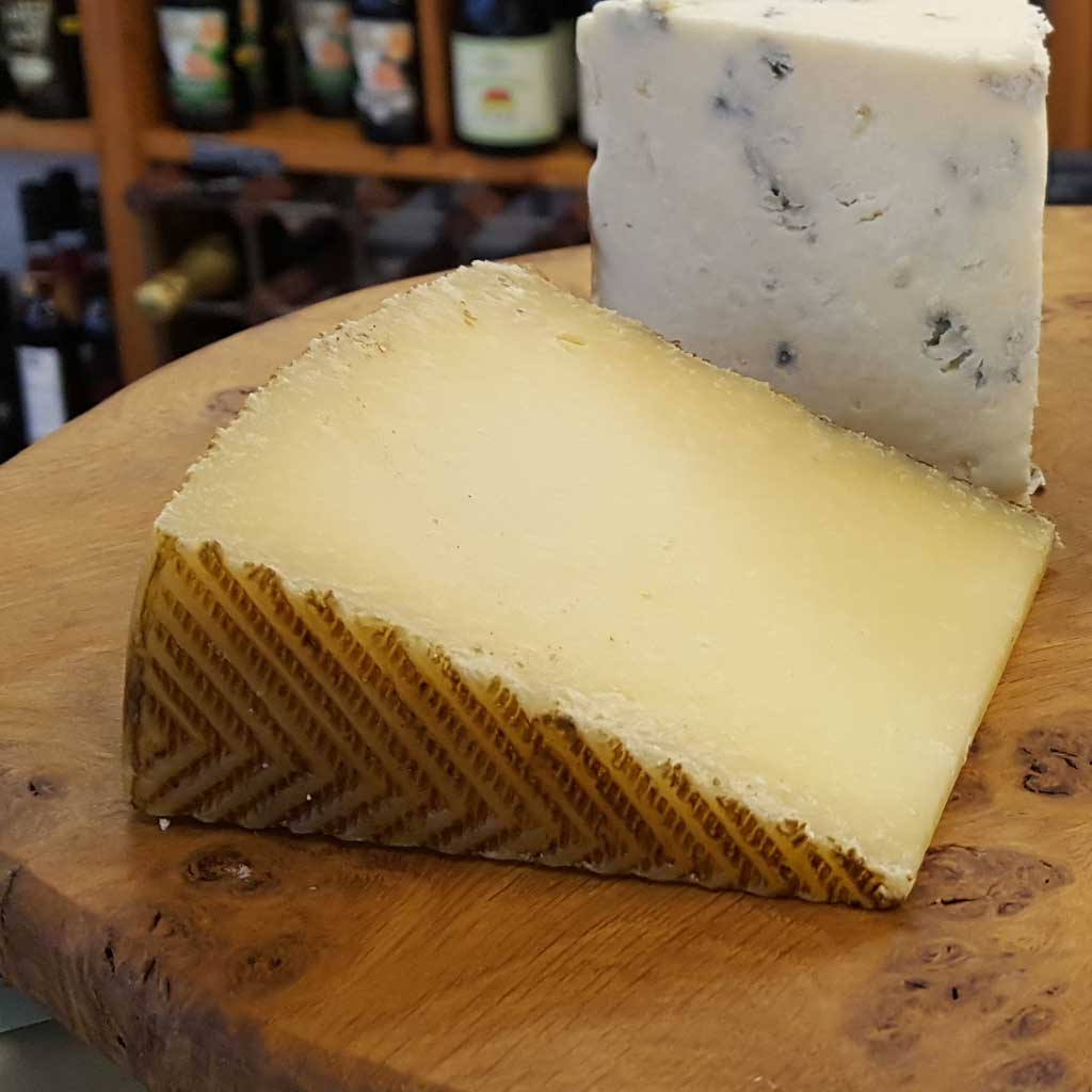 Manchego Cheese, traditional Spanish Ewe's milk cheese