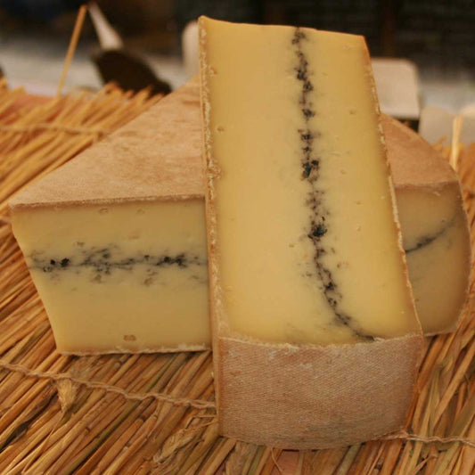 Morbier Cheese, Traditional semi soft french cheese with a layer of ash